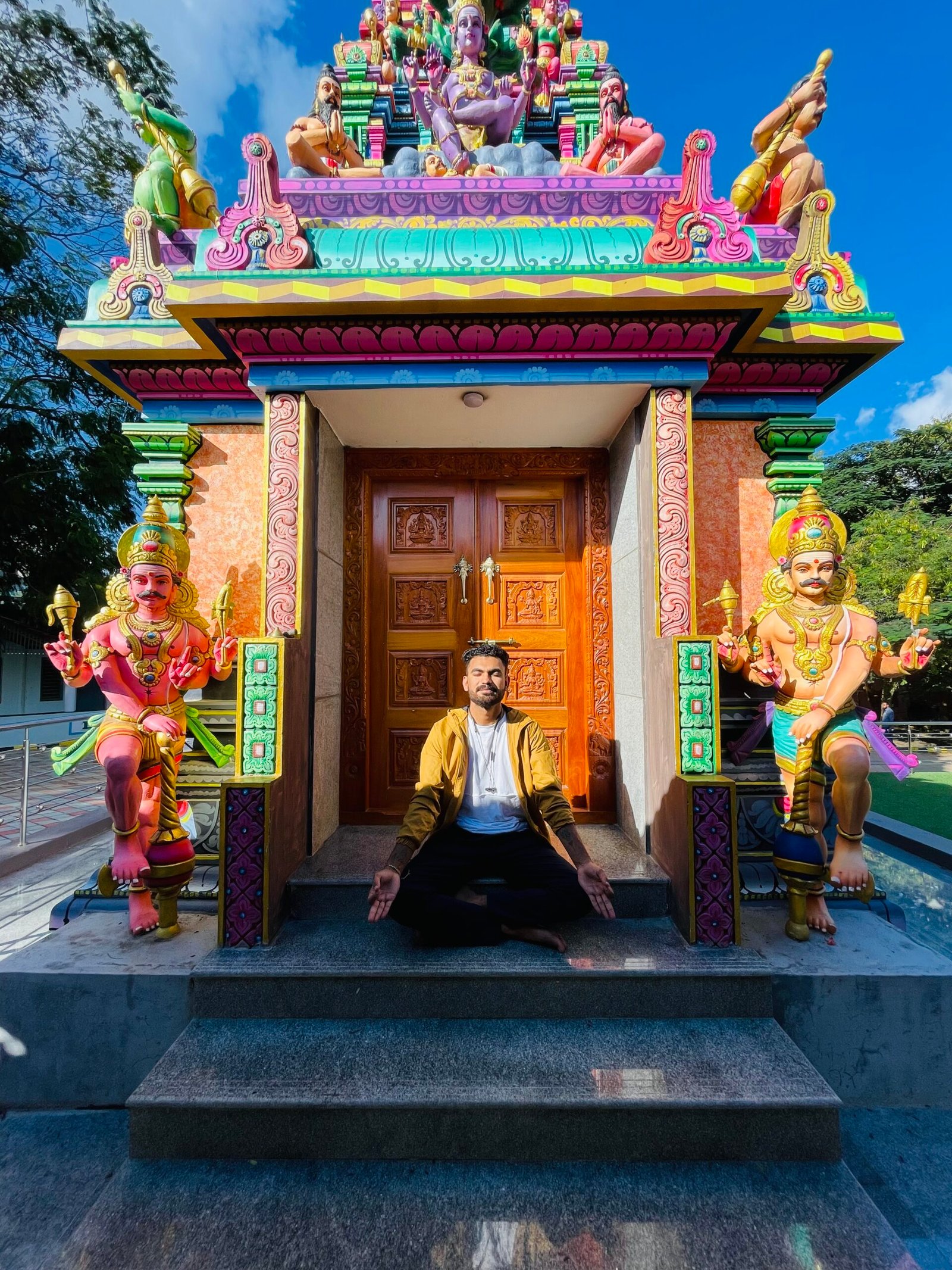 Taarun Pratap Singh, the Dragon Mentor, with glowing golden energy.